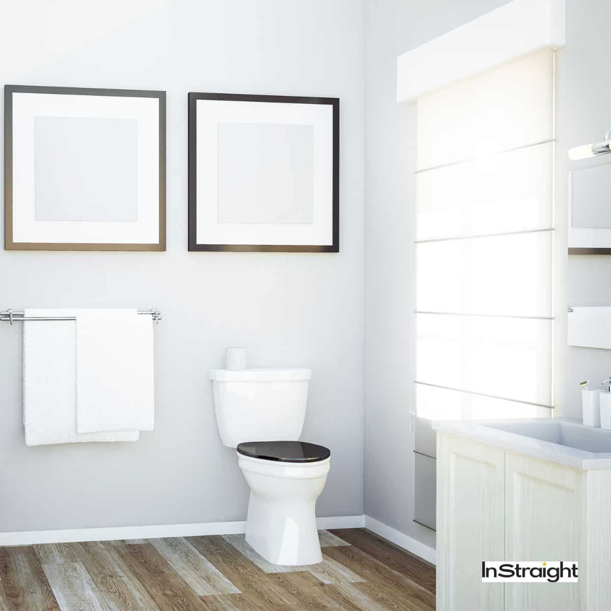 bathroom with framed mirrors